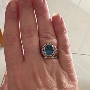 Levian rose gold ring with nude & white diamonds circling a beautiful blue topaz